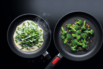 Kochen mit Gusspfannen der Woll Serie Nowo Titanium