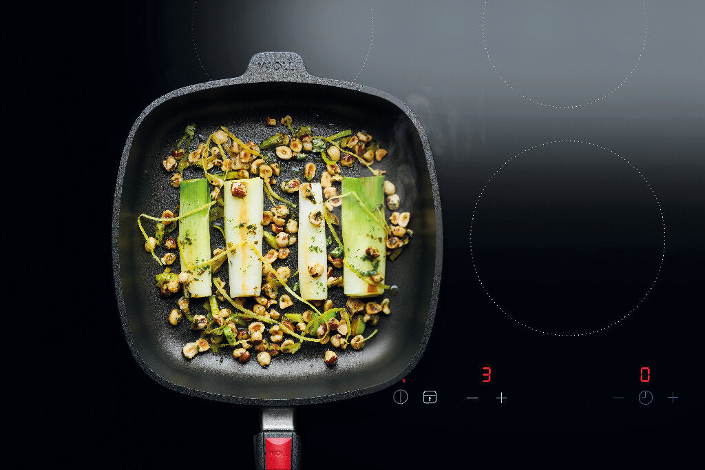 Kochen mit Gusspfannen der Woll Serie Nowo Titanium