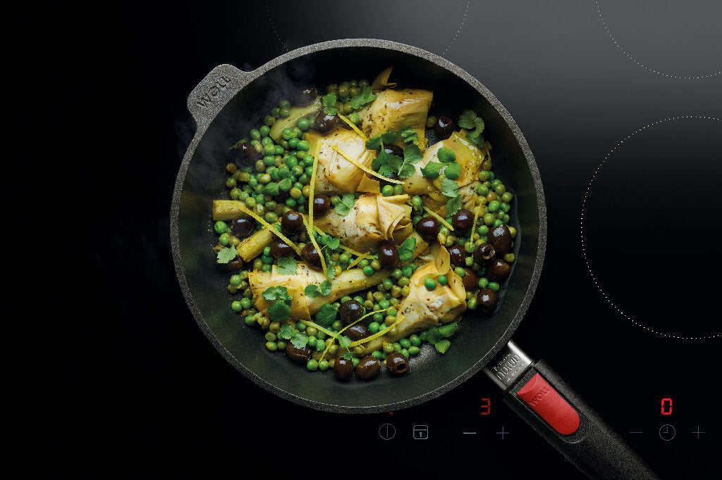 Kochen mit Guss-Hochrandpfannen der Woll Serie Nowo Titanium