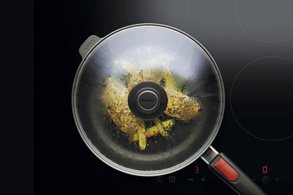 Kochen mit Guss-Hochrandpfannen der Woll Serie Nowo Titanium