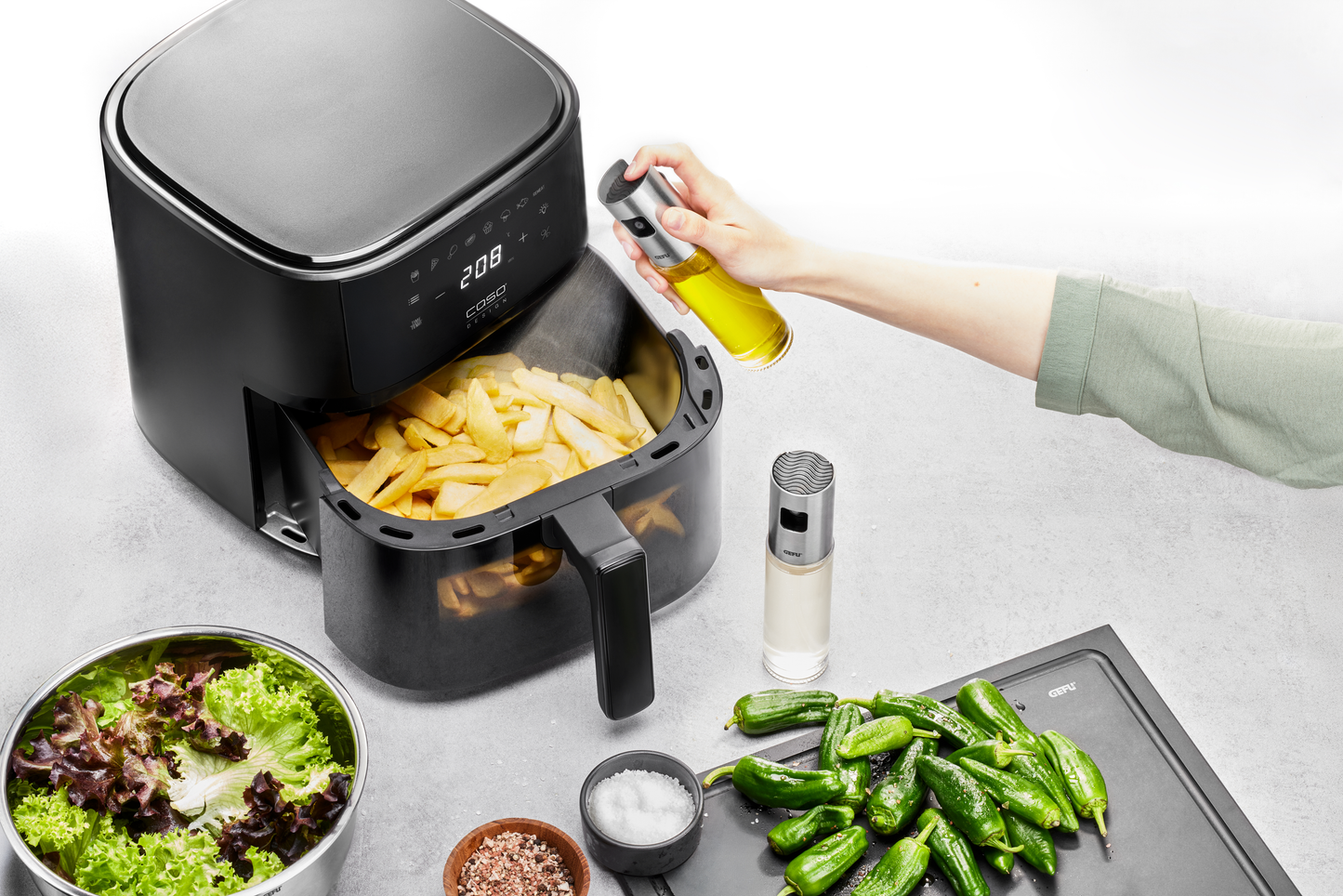 Öl-Sprüher für die Heißluftfritteuse nutzen