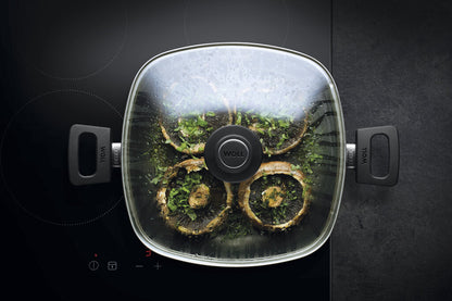 Kochen mit Servierpfanne der Woll Serie Nowo Titanium